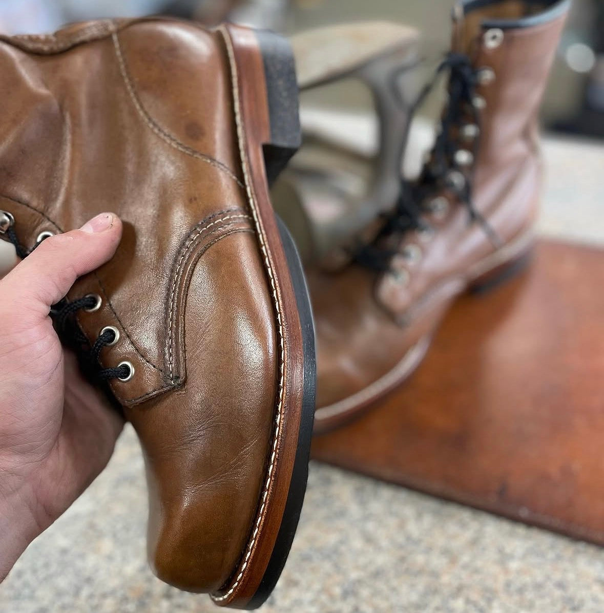 Boot sole and heel rebuild showing Dr. Sole cork half sole