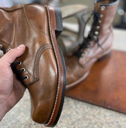 Boot sole and heel rebuild showing Dr. Sole cork half sole