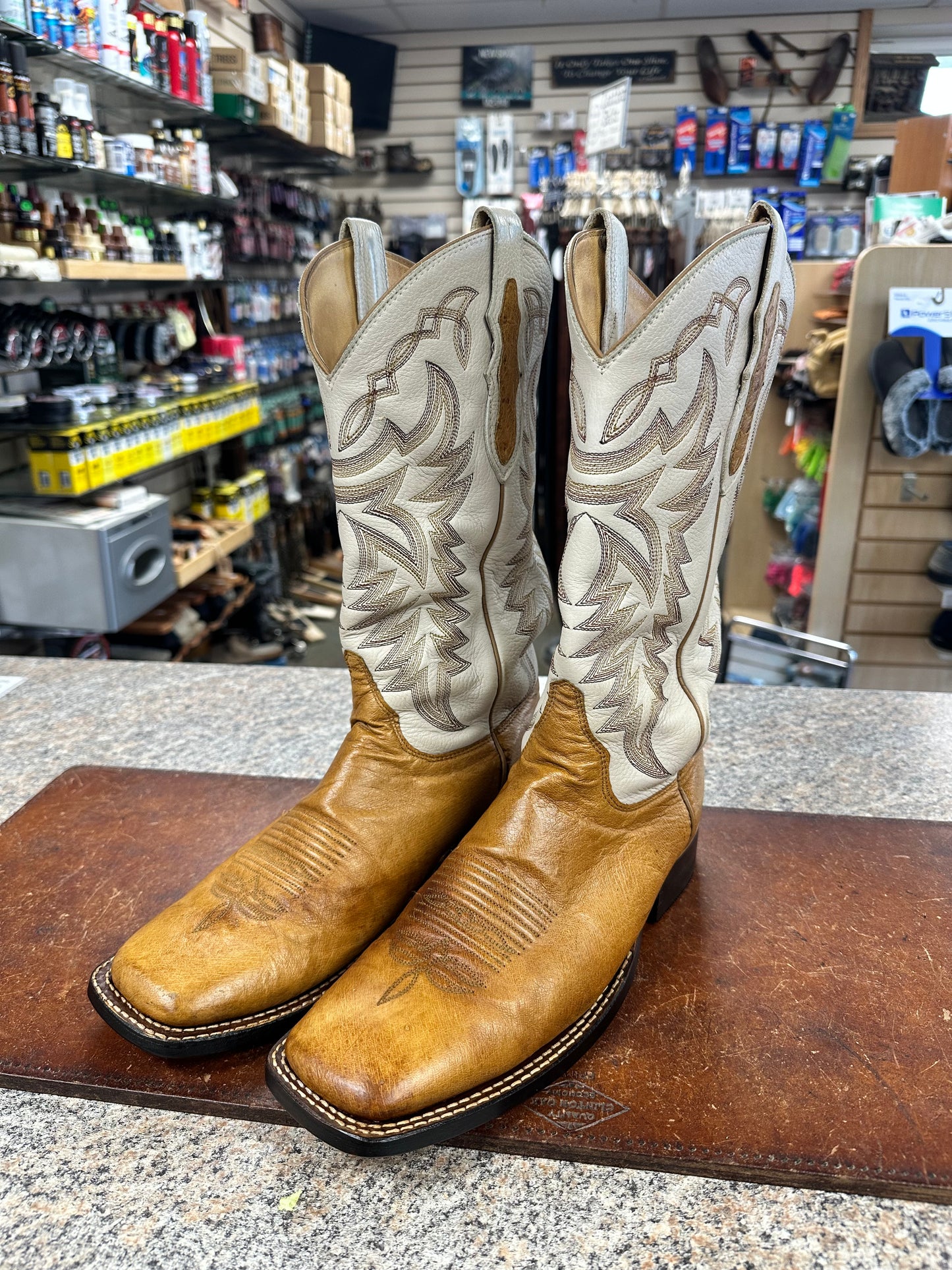 Resoled double row stitching on a pair of cowboy boots.