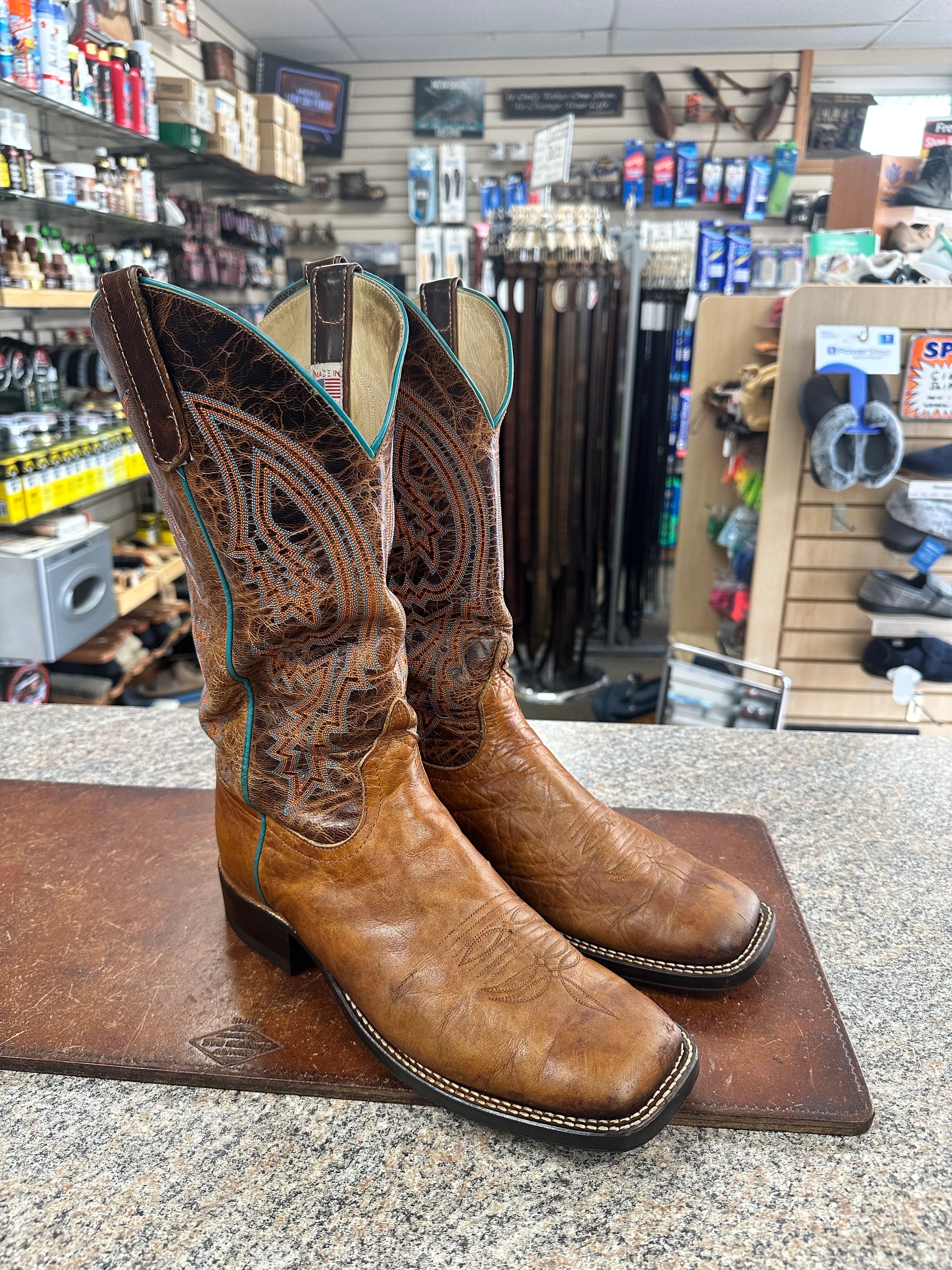 Leather sole stitching detail on cowboy boot resole