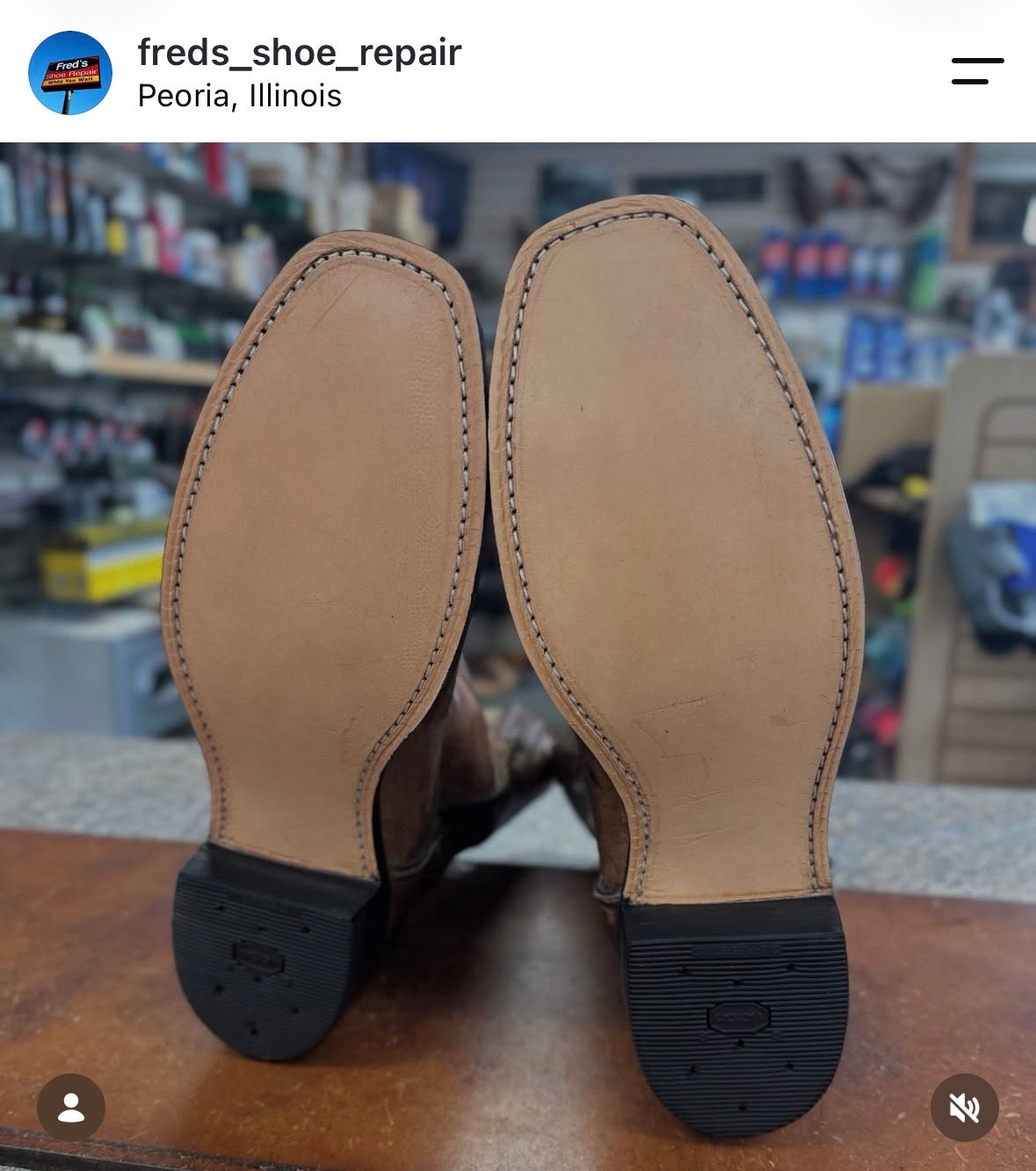 Vibram Cowboy heel close-up - black color, with natural color leather soles