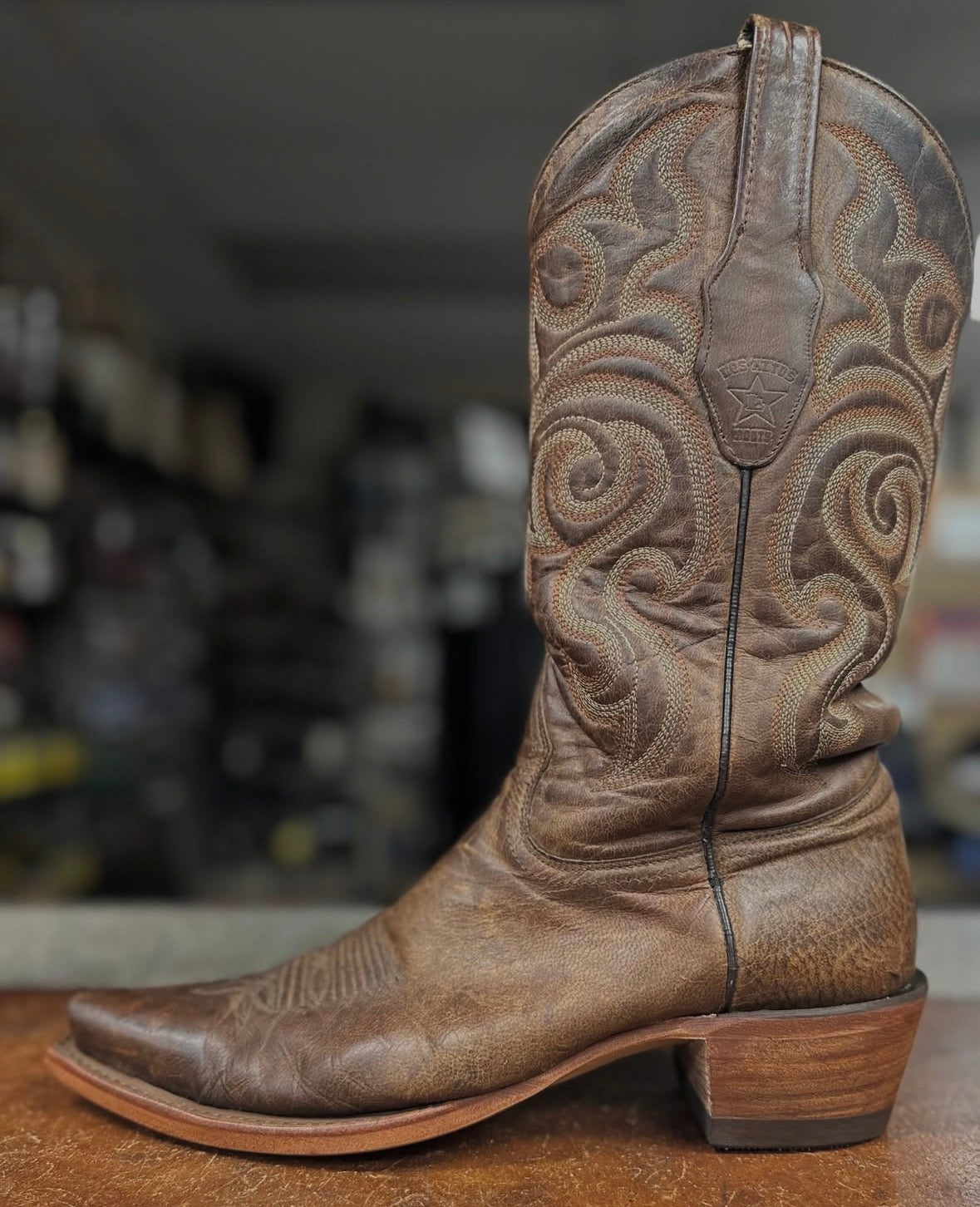 Full cowboy boot resole completed - Fred's Shoe Repair Peoria IL